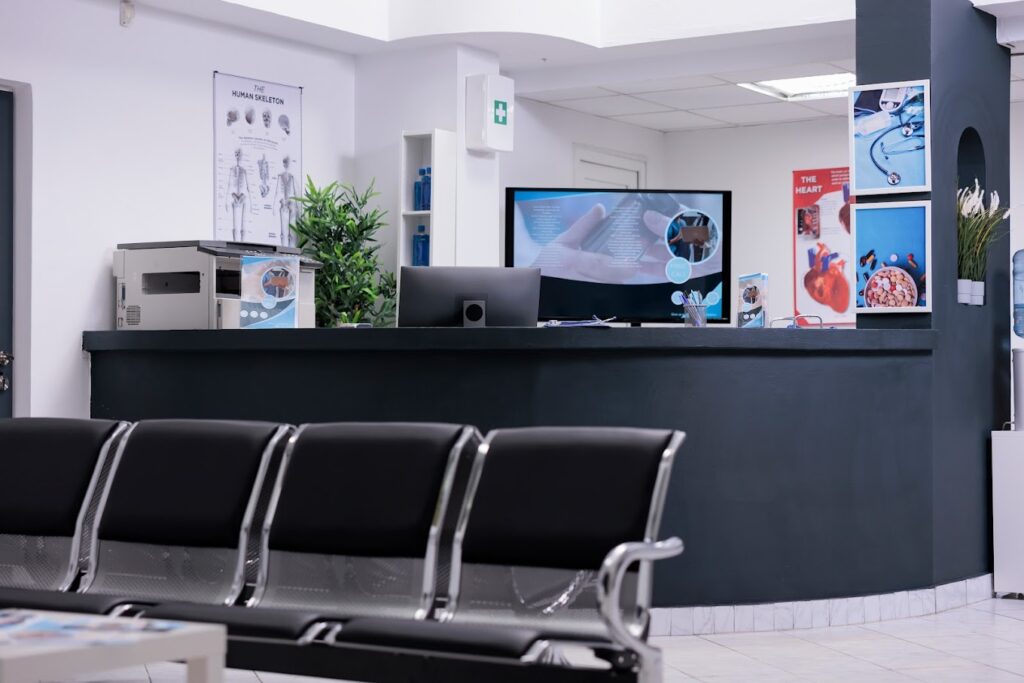 clinic-registration-counter-waiting-room-lobby-computer-make-checkup-appointments-with-healthcare-report-papers-empty-hospital-reception-desk-with-medical-forms-insurance-support
